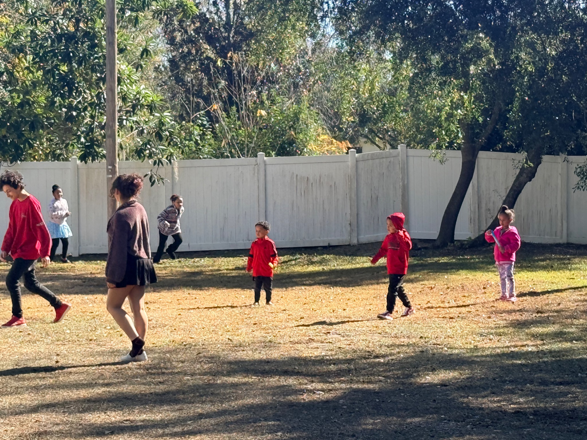 Achieve Now students and educators participating in an outdoor group activity
